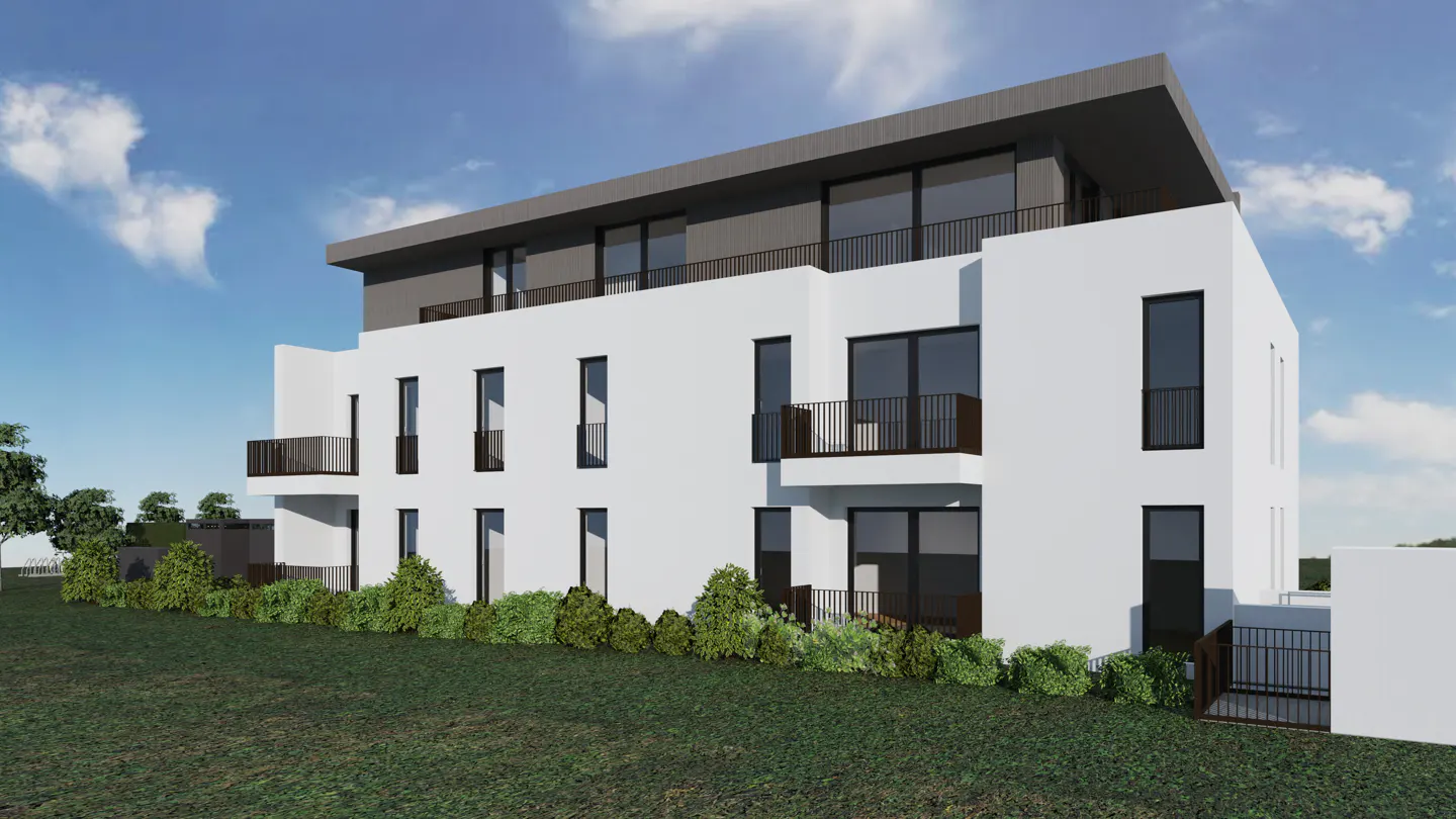 Modern three-story white apartment building with gray roof and black framed windows and balconies, set against a blue sky.