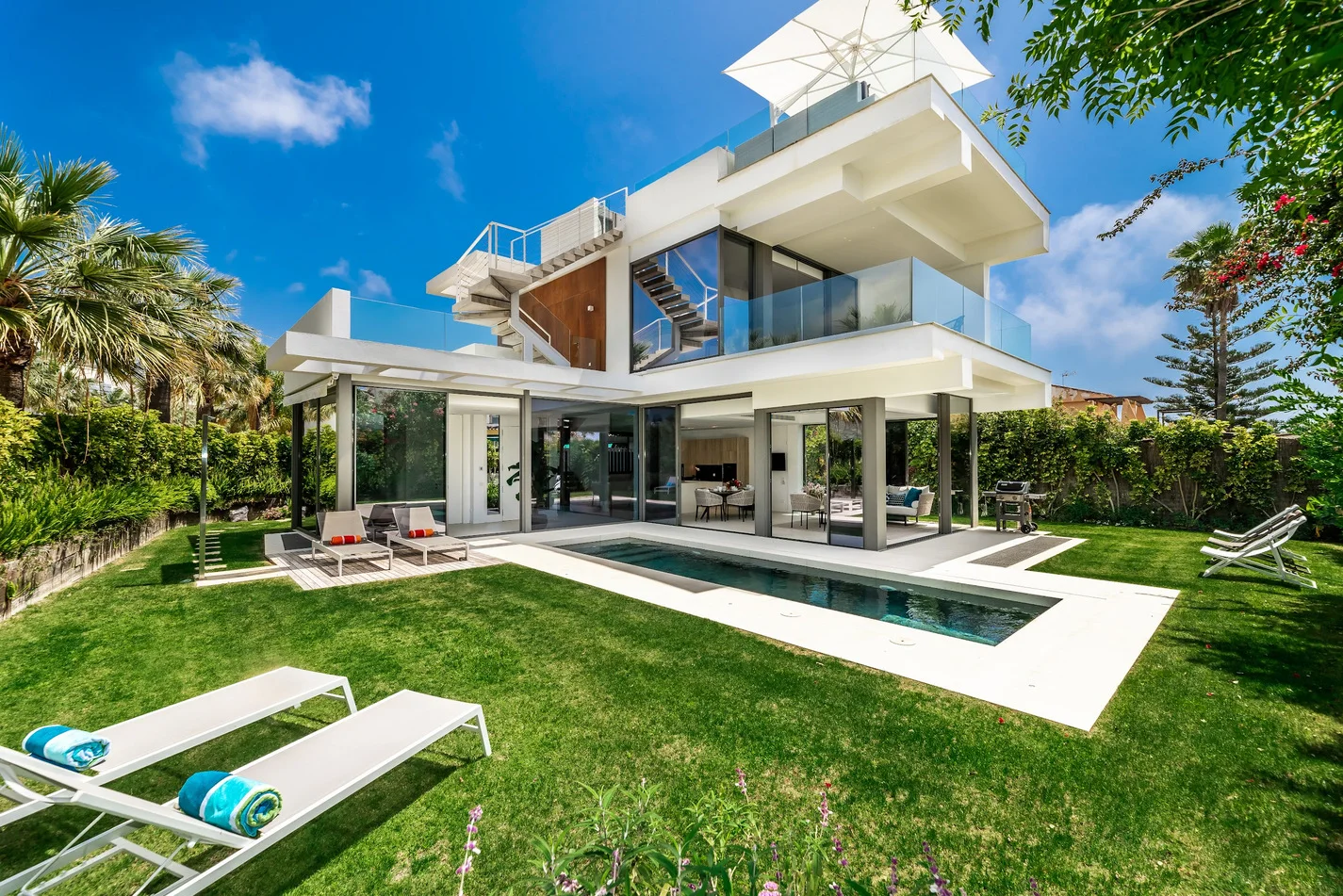 Modern beachside luxury villa with sea views. Price from €12,000 per week