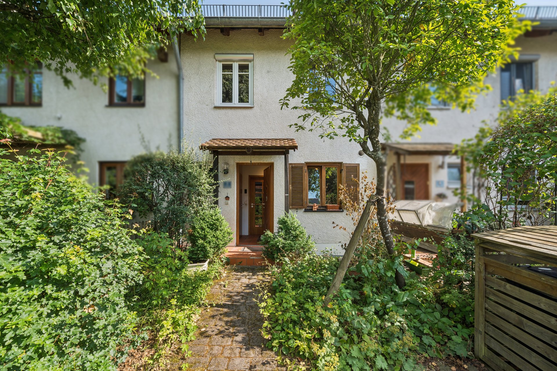 Ein Zuhause mit Potential – Familienhaus mit Garten und Kamin in Neufahrn