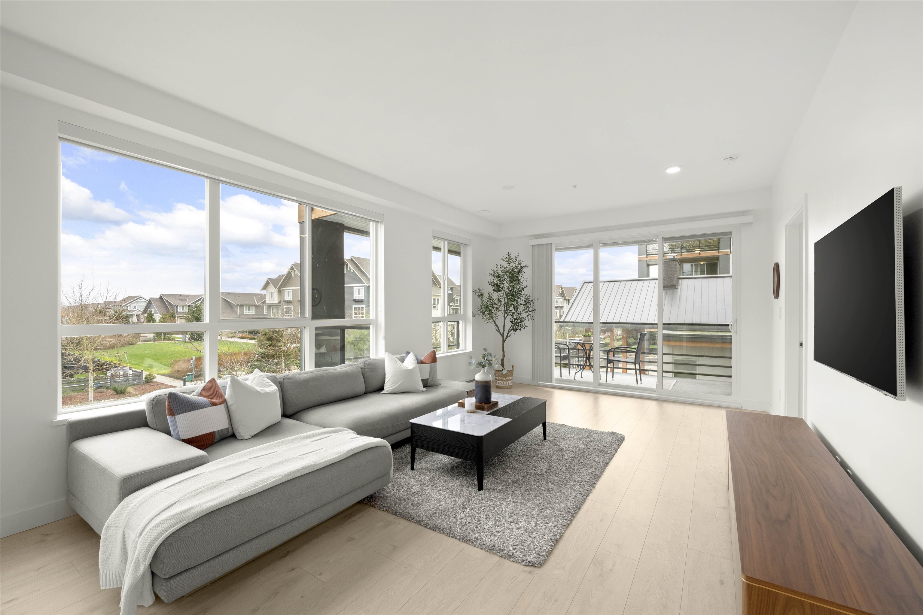 Corner Unit, Covered Balcony + Views!