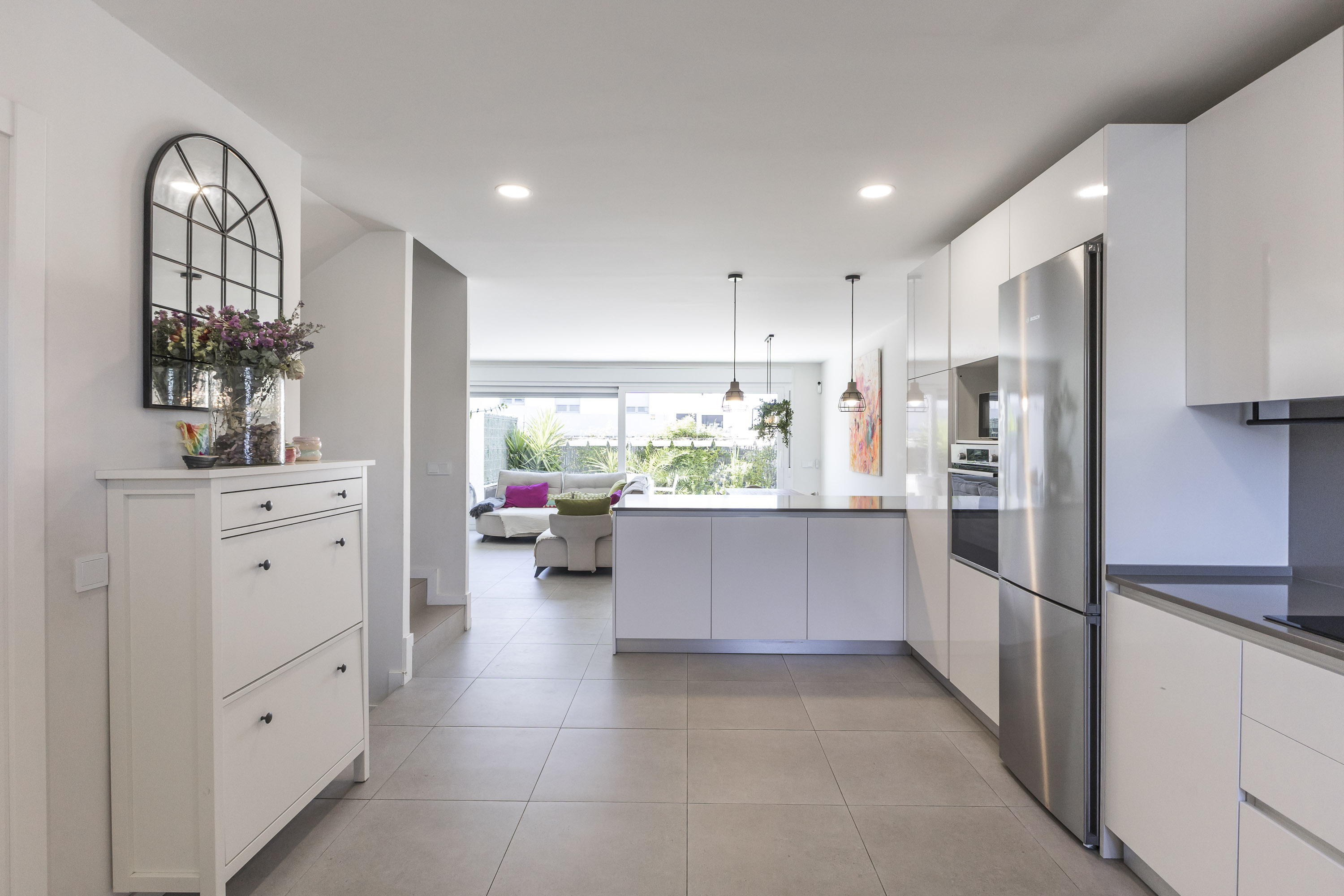 Exclusivo adosado de diseño contemporáneo, eficiencia energética y ático con terrazas en Tres Cantos