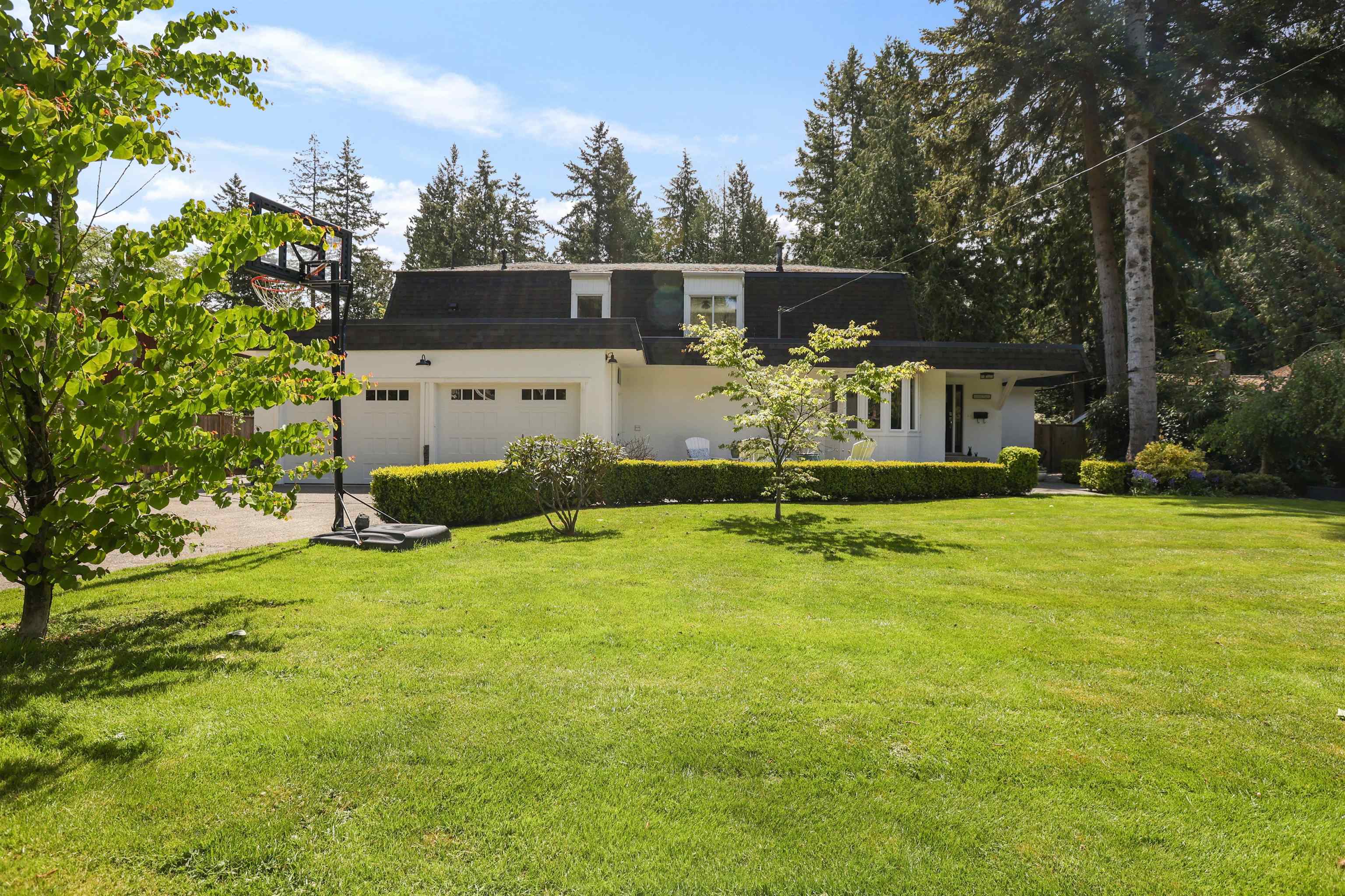 Spectacular South-Facing Family Home On Rare Half Acre Lot!