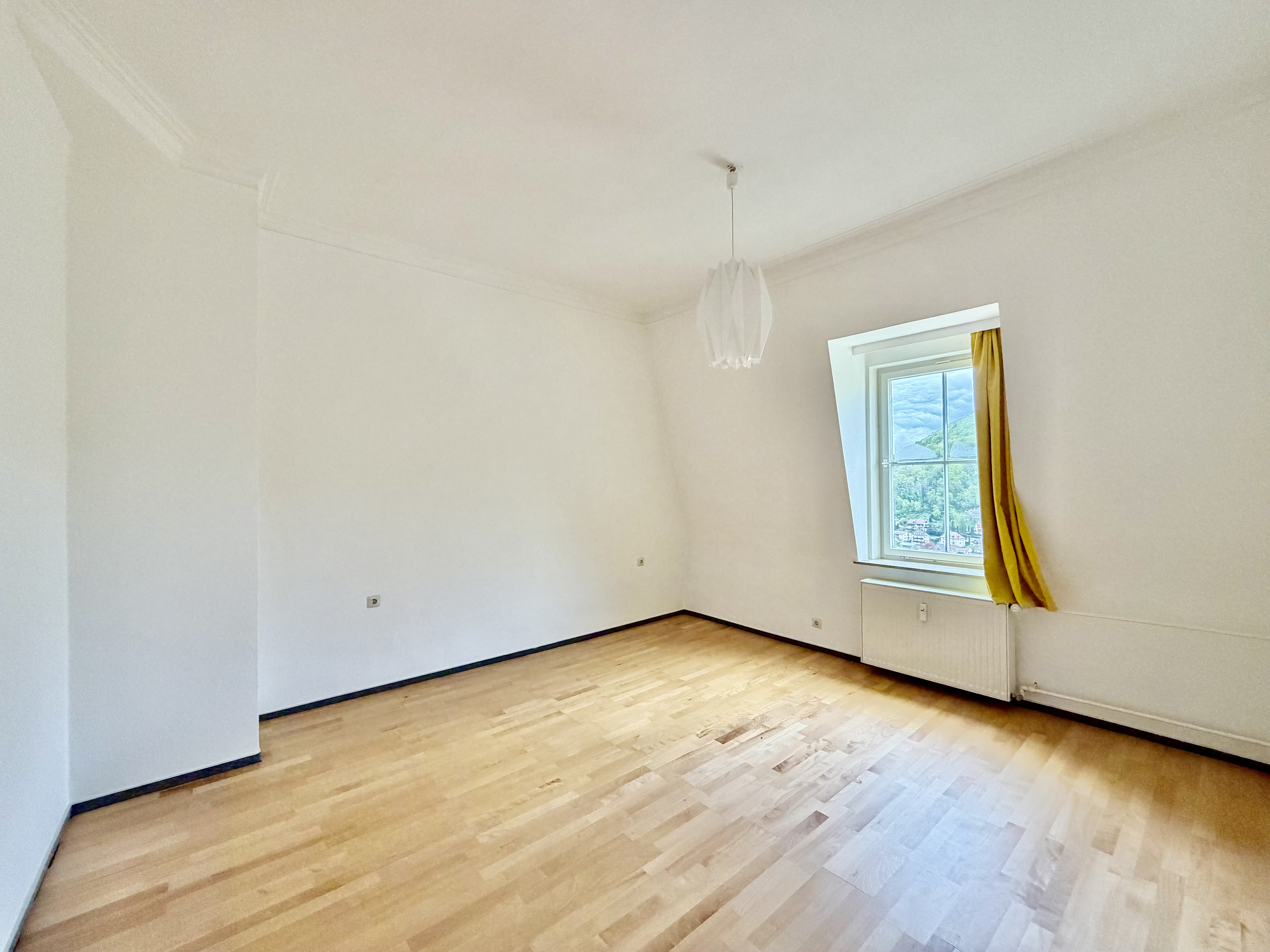 Historischer Charme trifft Moderne und Weitblick – 2-Zimmer-Wohnung in Bestlage