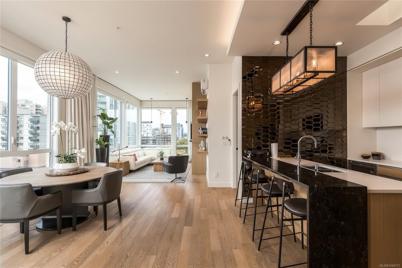 Penthouse Living in the Corner Unit of the Black & White