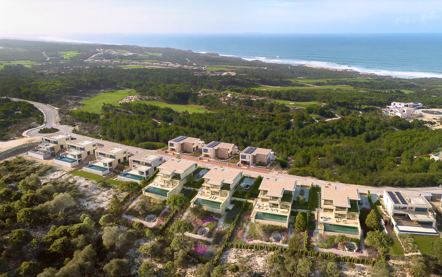 Aerial view of modern homes with pools, set against a backdrop of green trees, golf course, and ocean.