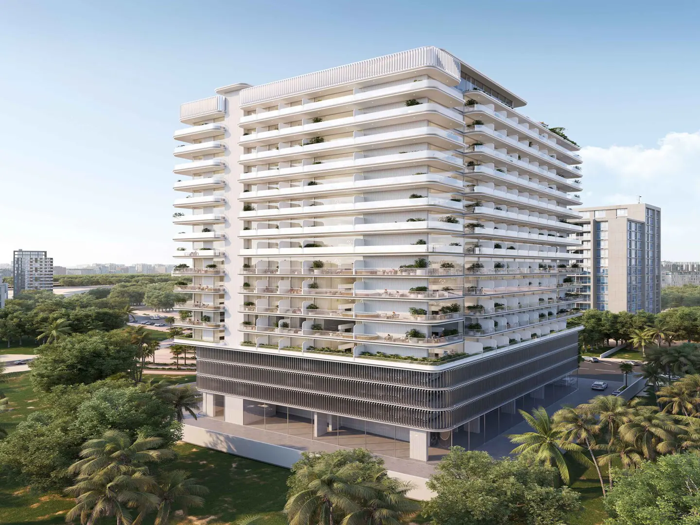 Modern white high-rise apartment building with stacked balconies, surrounded by lush green trees under a clear blue sky.