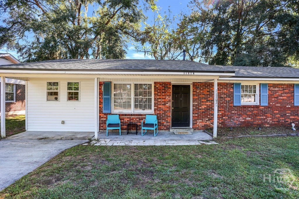 Embrace Brick Charm and Outdoor Living on Colleen Drive