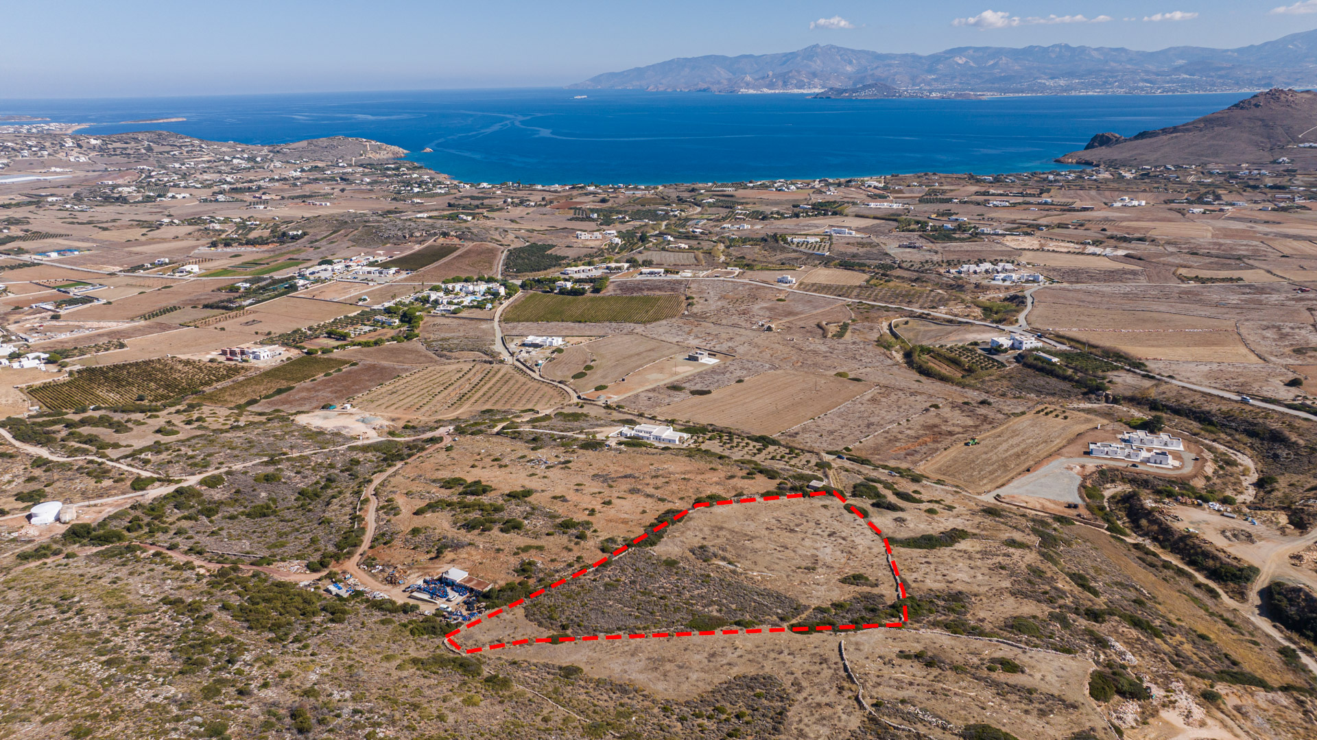 11,500 m² plot with permit and panoramic sea views in Tsoukalia, Paros