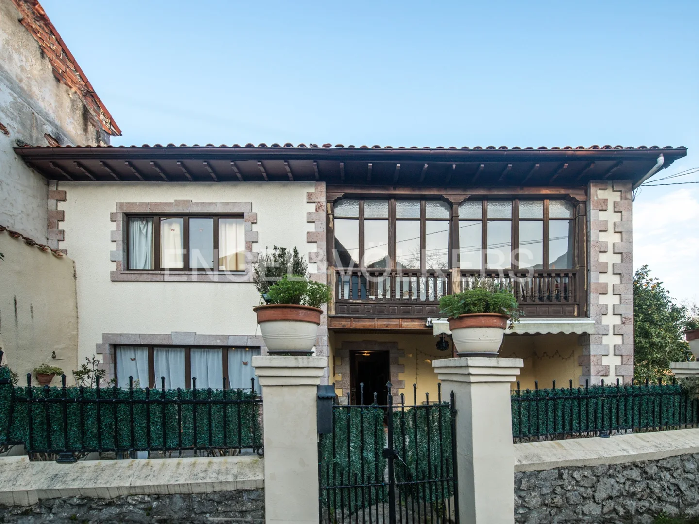 Asturian stone mansion and corridor in residential area