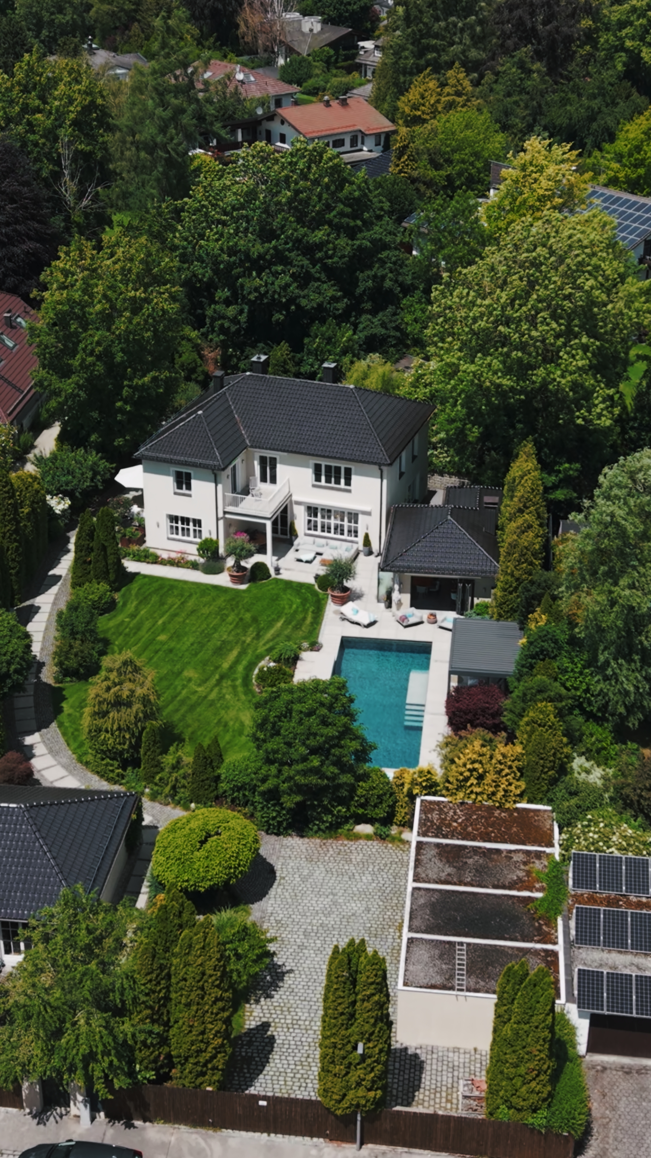 Mediterranean villa with separate front house