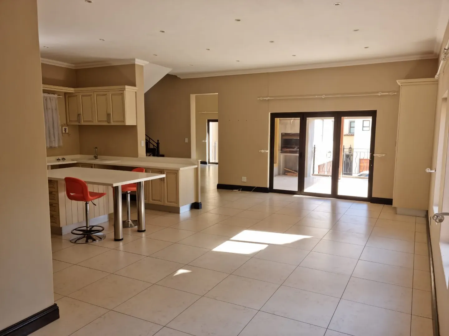 Large open plan kitchen to patio