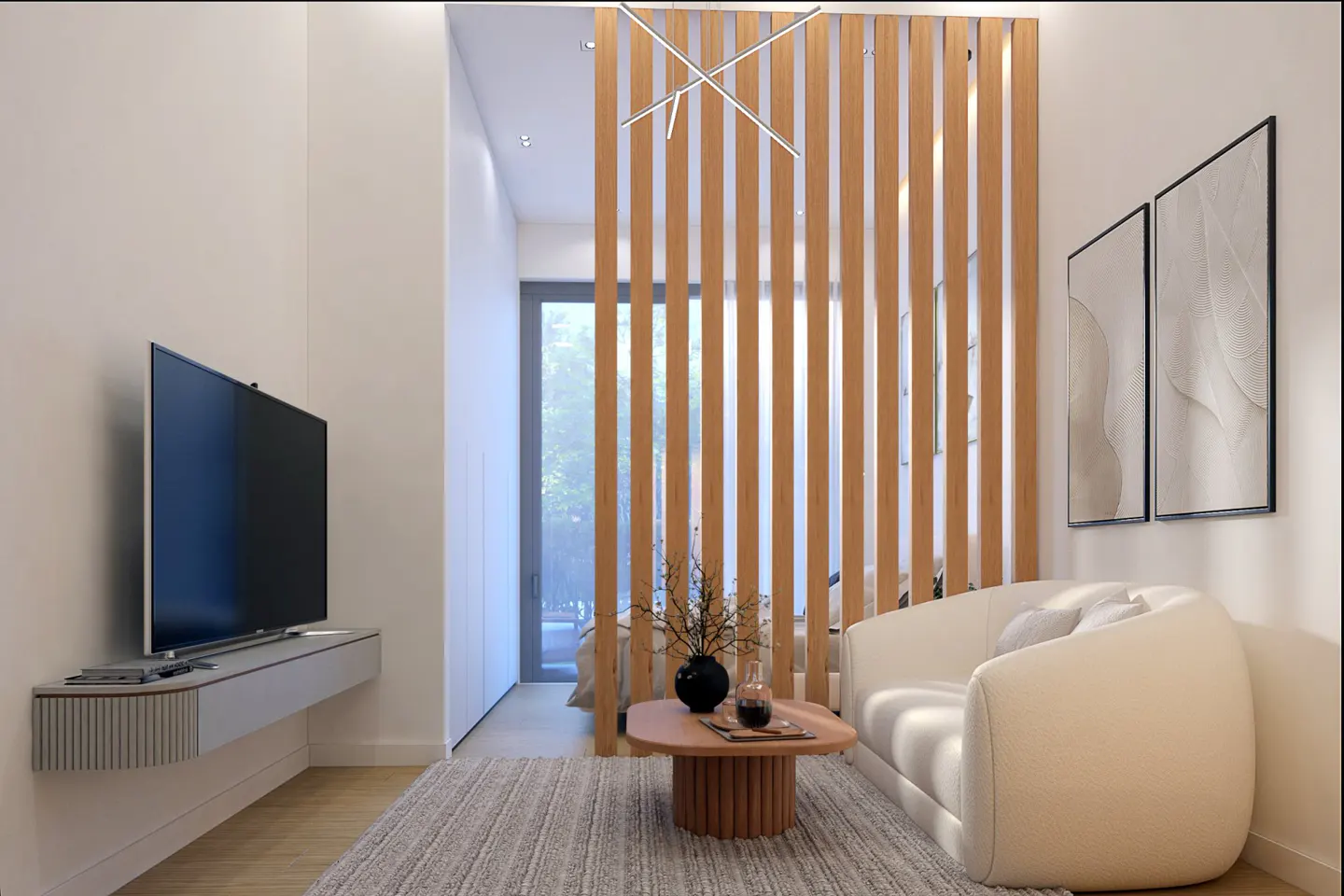 Living room with a white sofa, wood slat partition, and a TV on a floating shelf. Two framed art pieces hang on the wall.