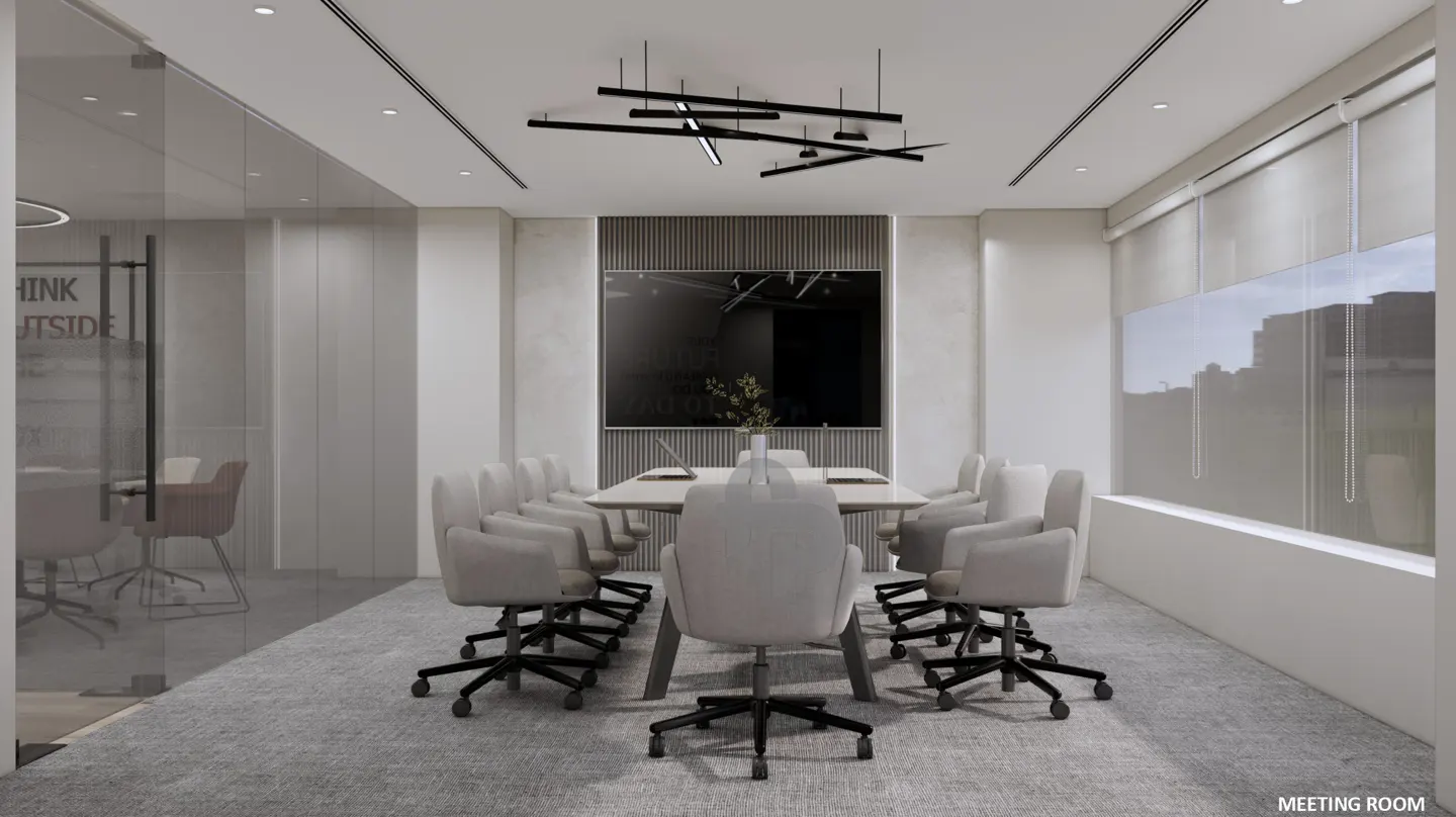 Modern meeting room with a long white table, grey swivel chairs, a wall-mounted screen, and a unique black linear light.