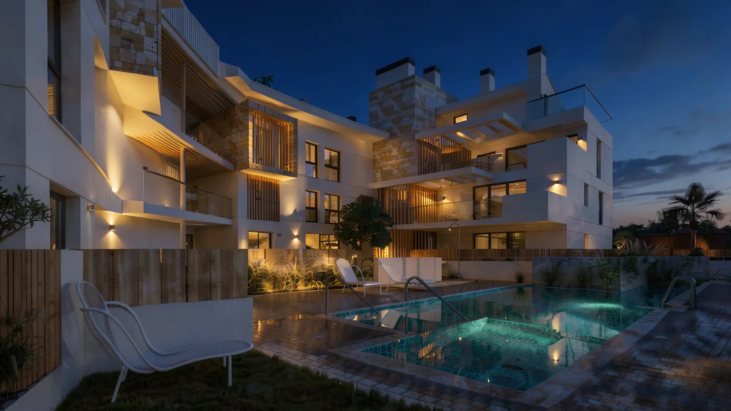 Exterior view of a modern, multi-story white building with balconies, a pool, and lounge chairs at dusk.