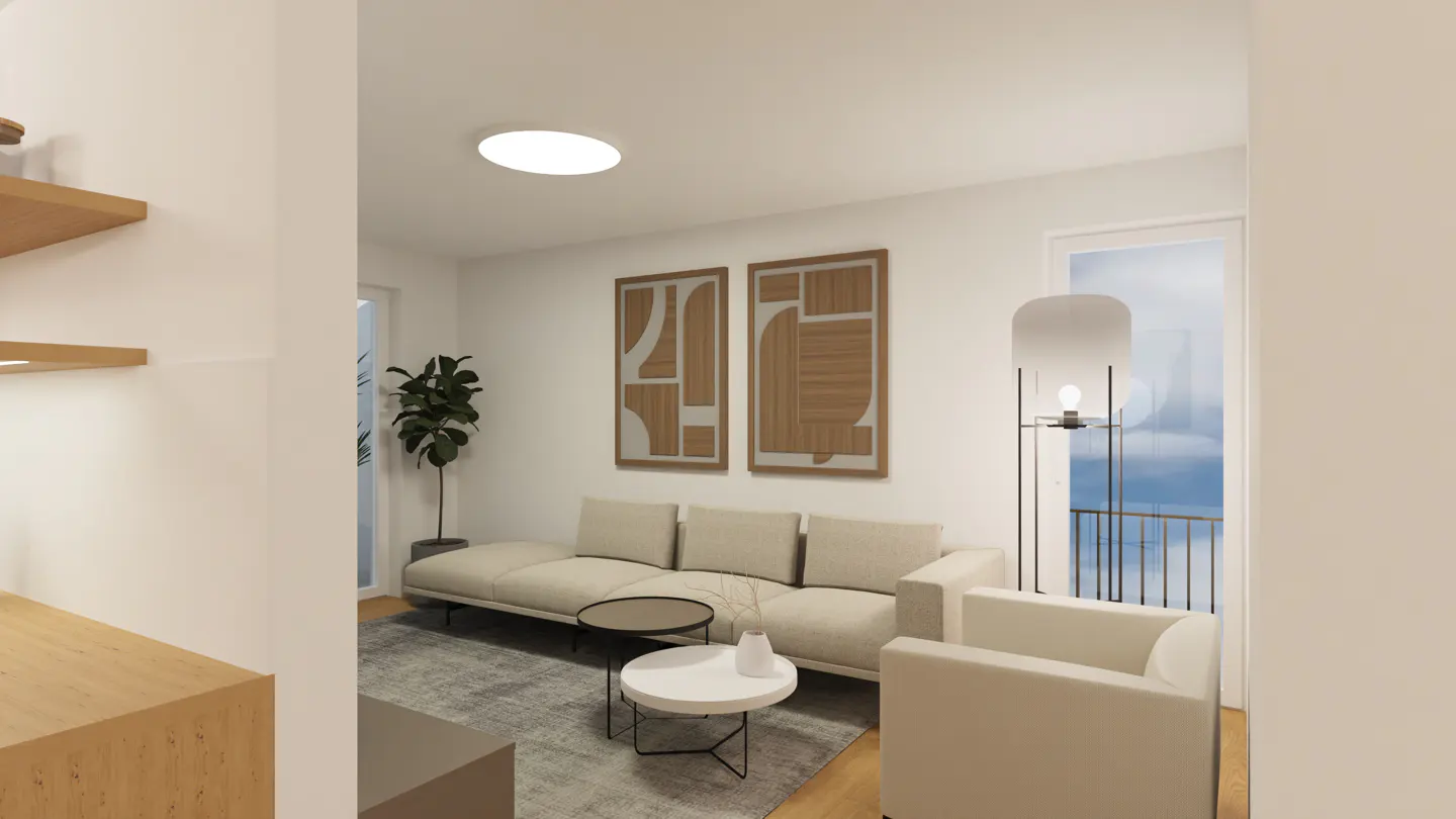 Living room with beige sofa, white armchair, and two abstract art pieces on the wall. A plant sits near a window.