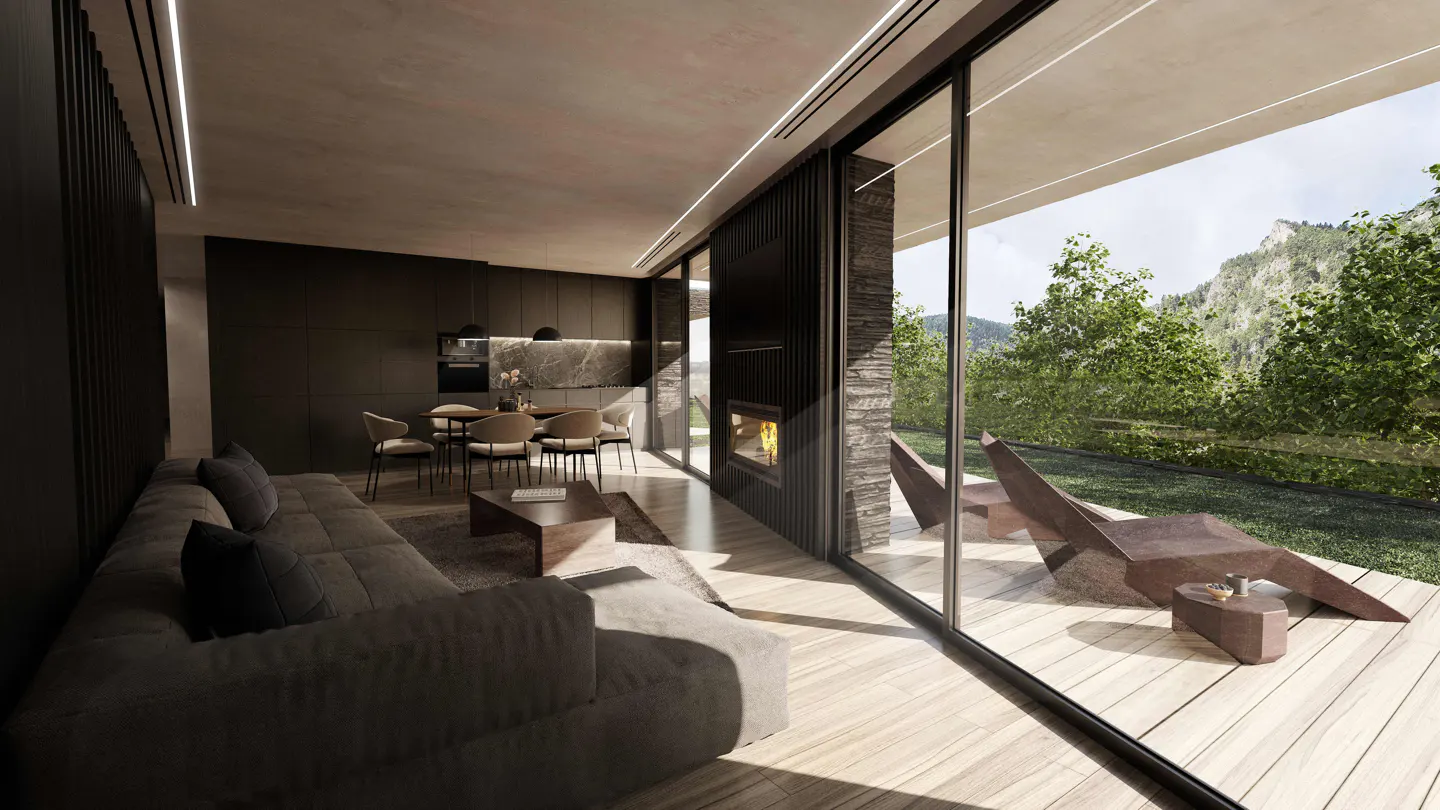 A modern living room with a gray sofa, dining table, and fireplace. Large glass doors open to a deck with lounge chairs and a mountain view.