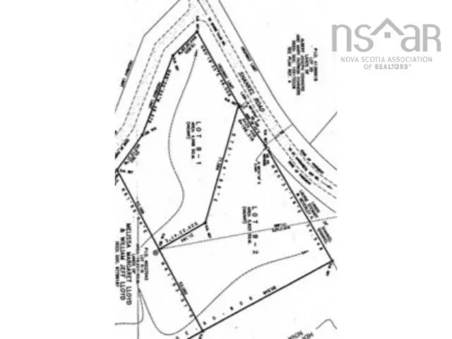 Black and white real estate plot map showing property lines, roads, and lot numbers.