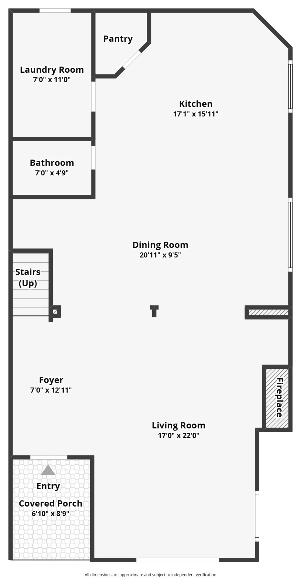 Floor plan showing a main level with a foyer, living room with fireplace, dining room, kitchen, pantry, bath, and laundry.