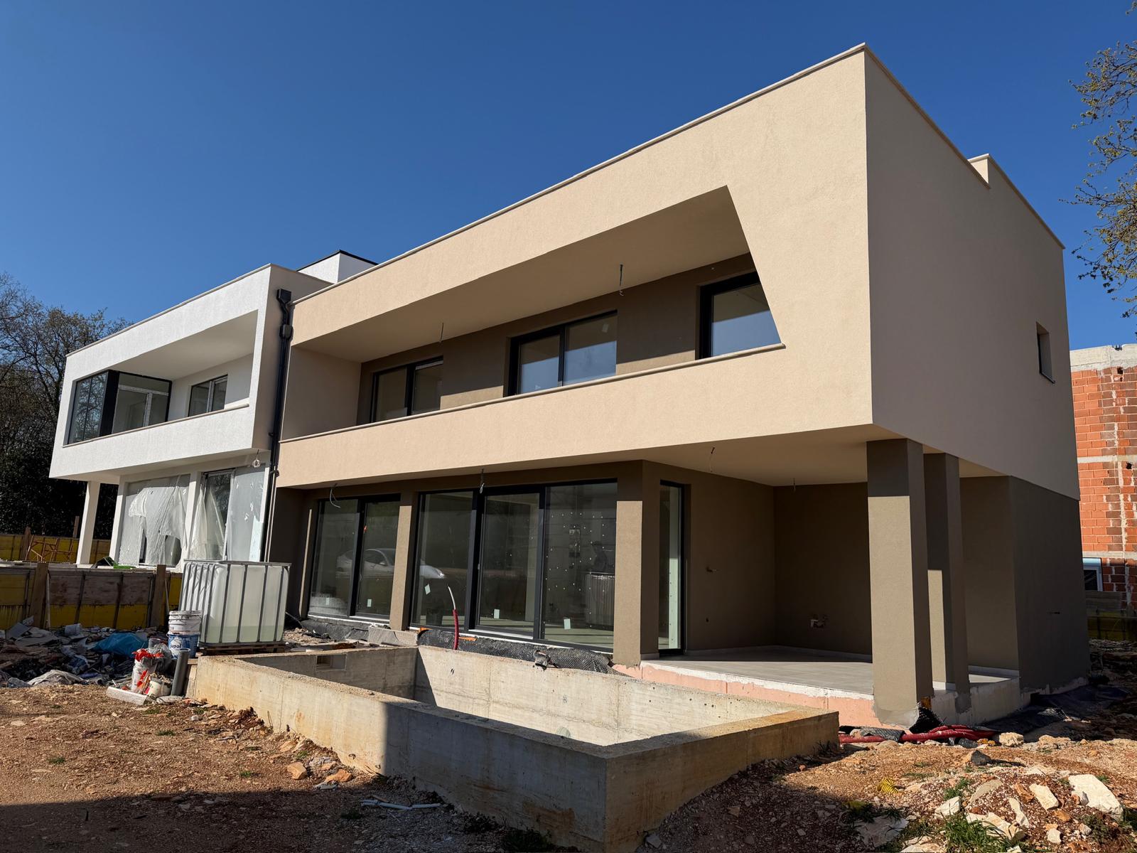 Moderne Doppelhaushälfte mit Dachterrasse & Meerblick fußläufig zur Küste