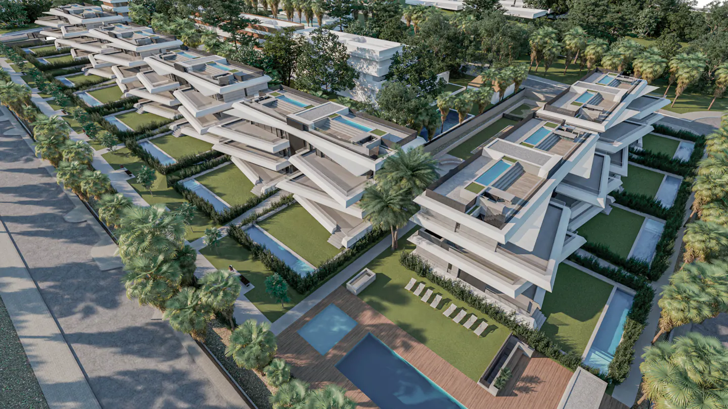 Aerial view of modern white villas with pools, green lawns, and palm trees.