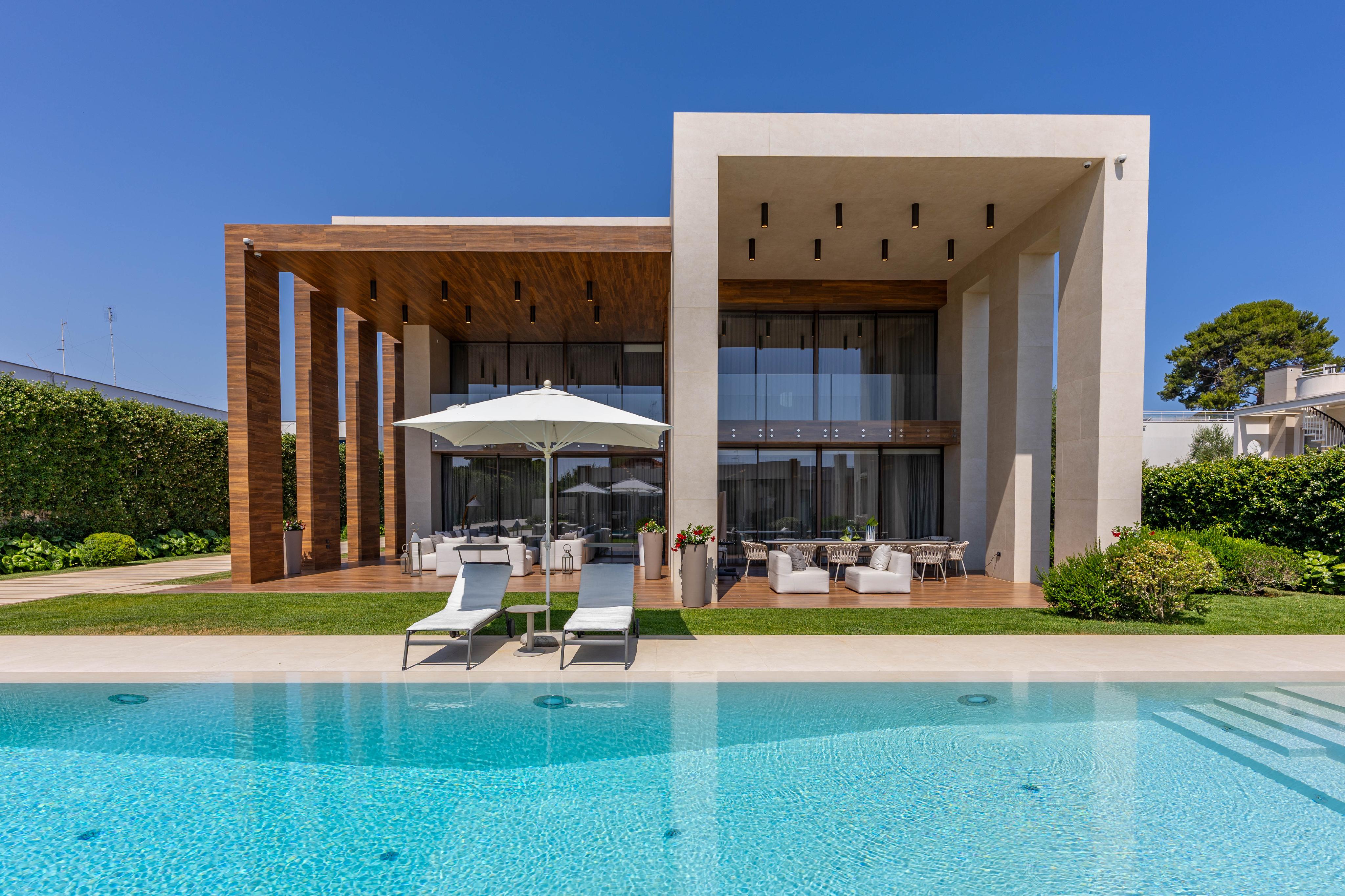Exclusive designer villa with pool in Torre a Mare