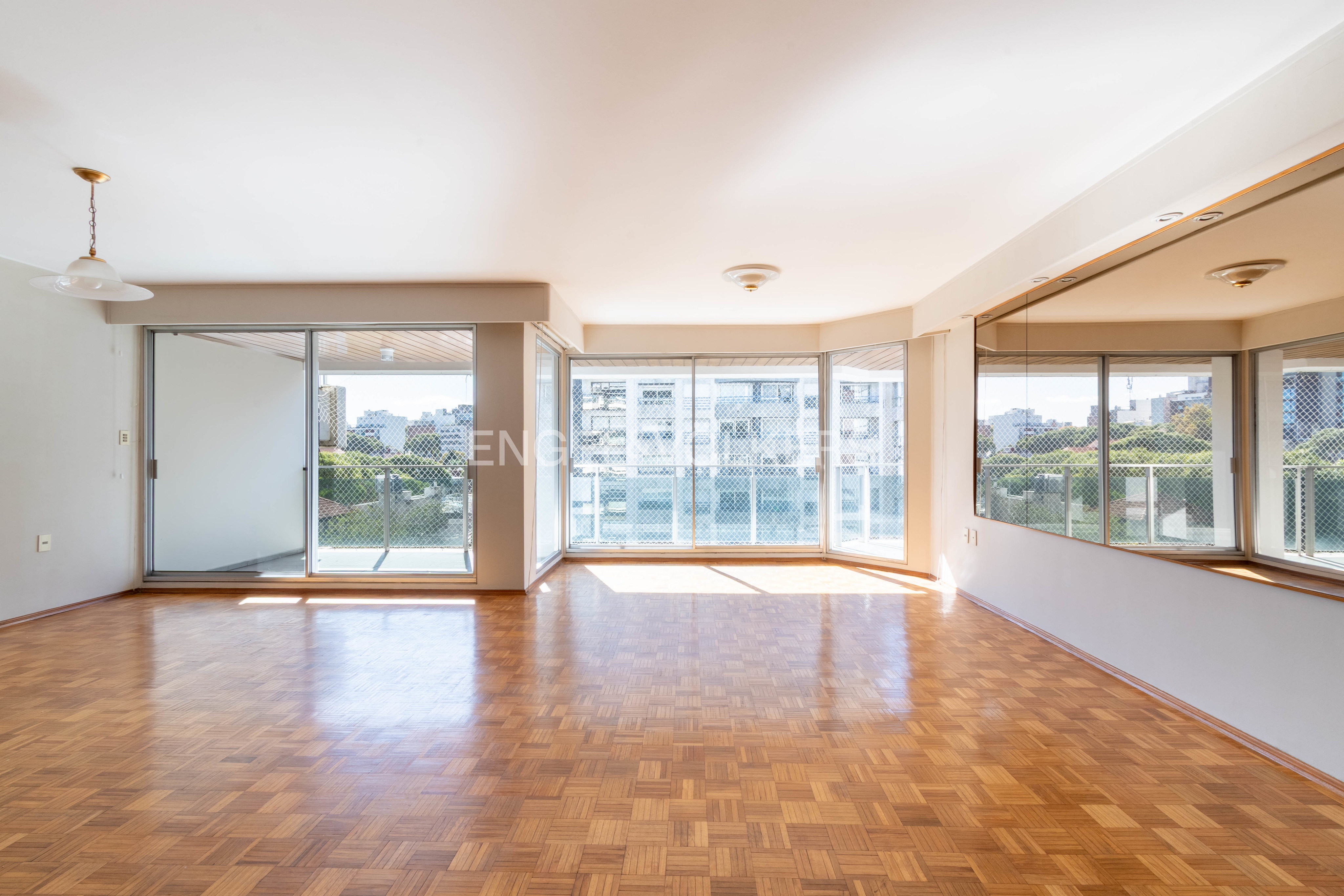 Bright apartment in Pocitos with 3 bedrooms , balcony, and double garage parking.