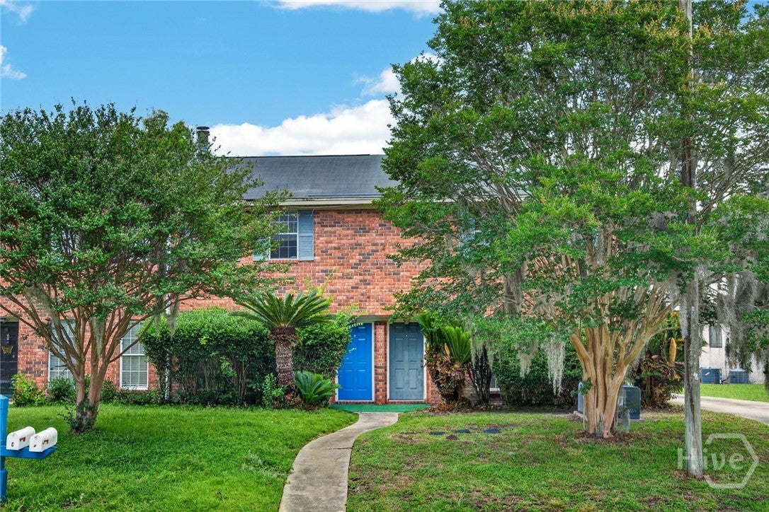 Investor Opportunity: End-Unit Townhome  With Potential!
