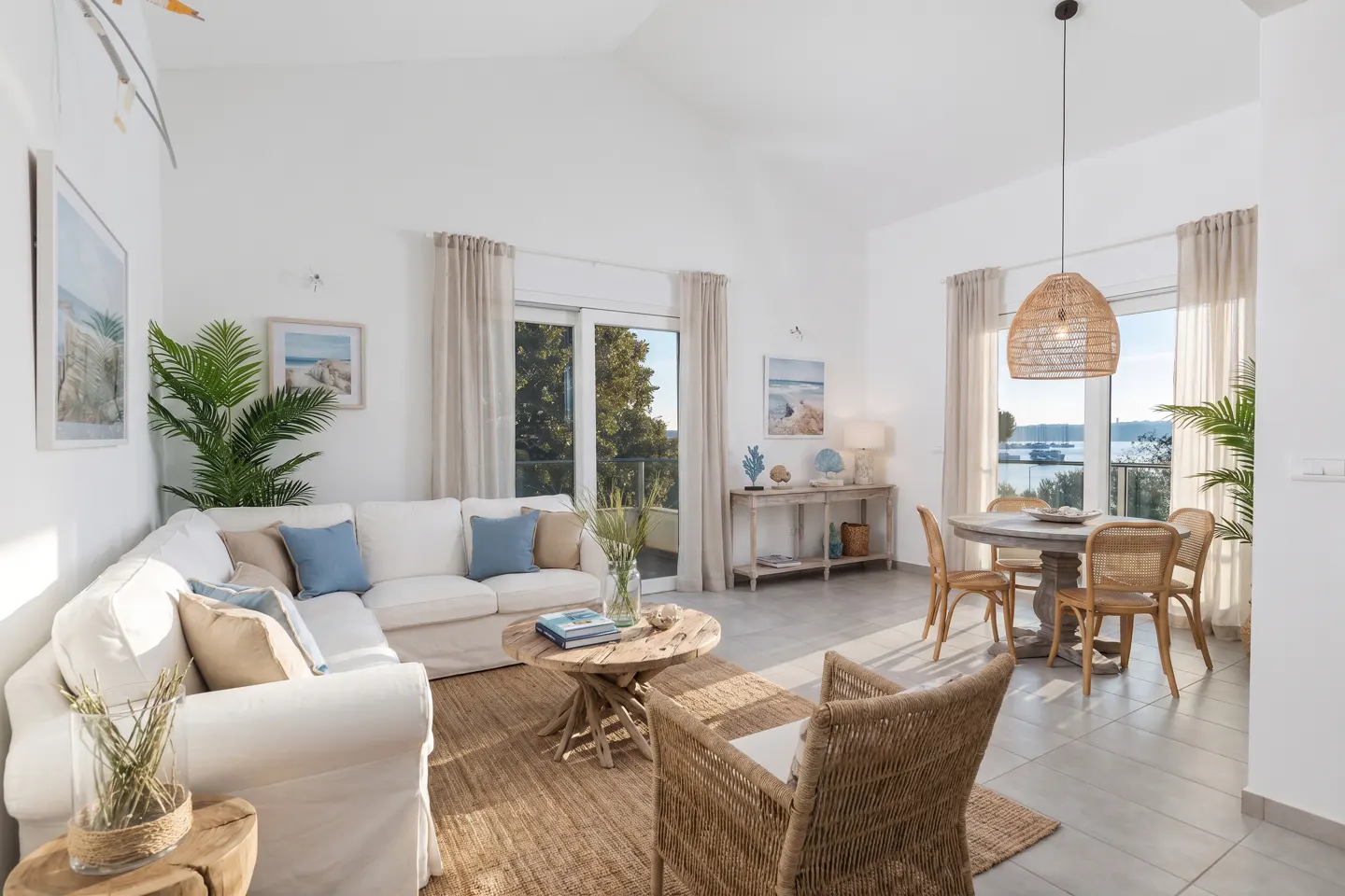 AI-generated visualisation of the light-filled living/dining area in a Mediterranean coastal style (furniture not included)