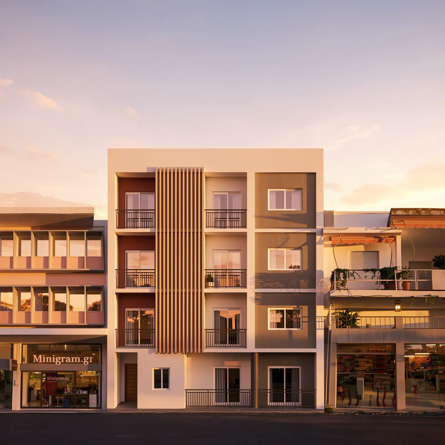 Three-story apartment building with balconies, next to storefronts under a sunset sky.