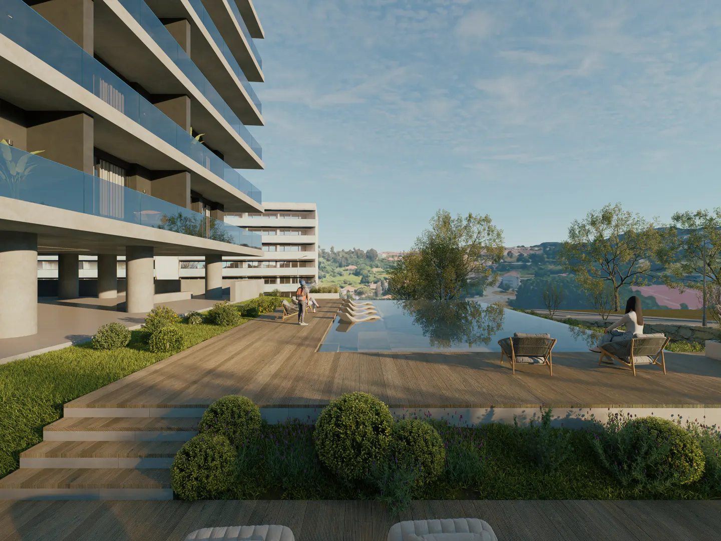 Modern apartment building with a pool and lounge area overlooking a green landscape. People are relaxing and exercising.