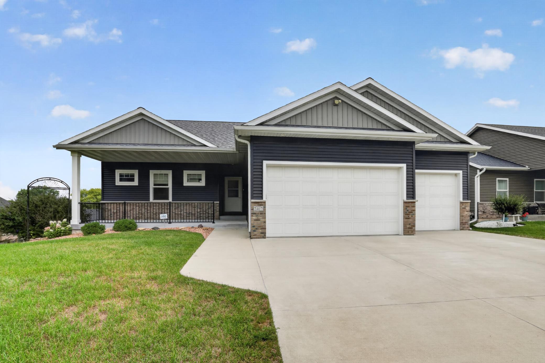 4-Bed NW Rochester Rambler with Heated 3-Car Garage