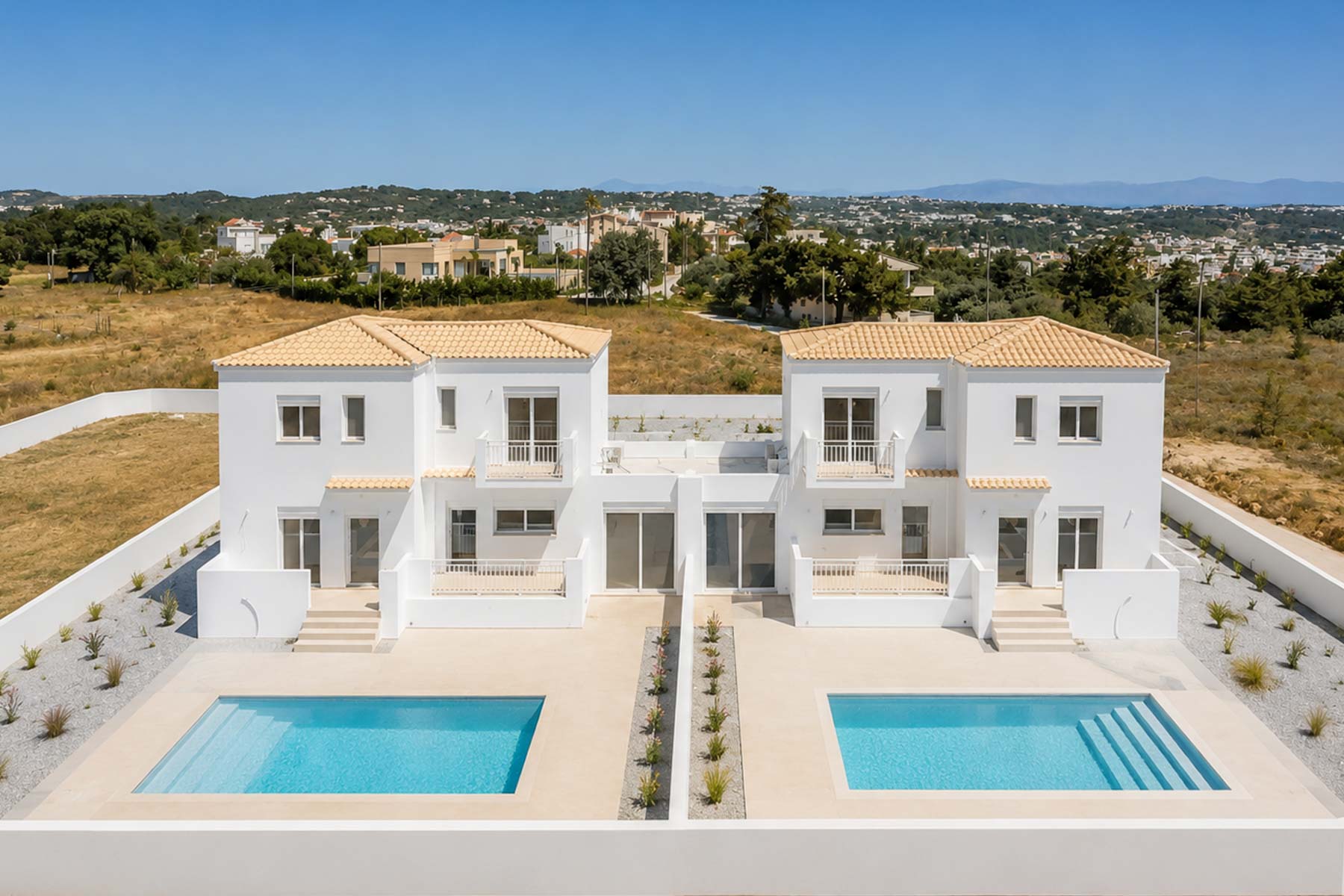 Newly built detached homes with pool and sea views in Koskinou