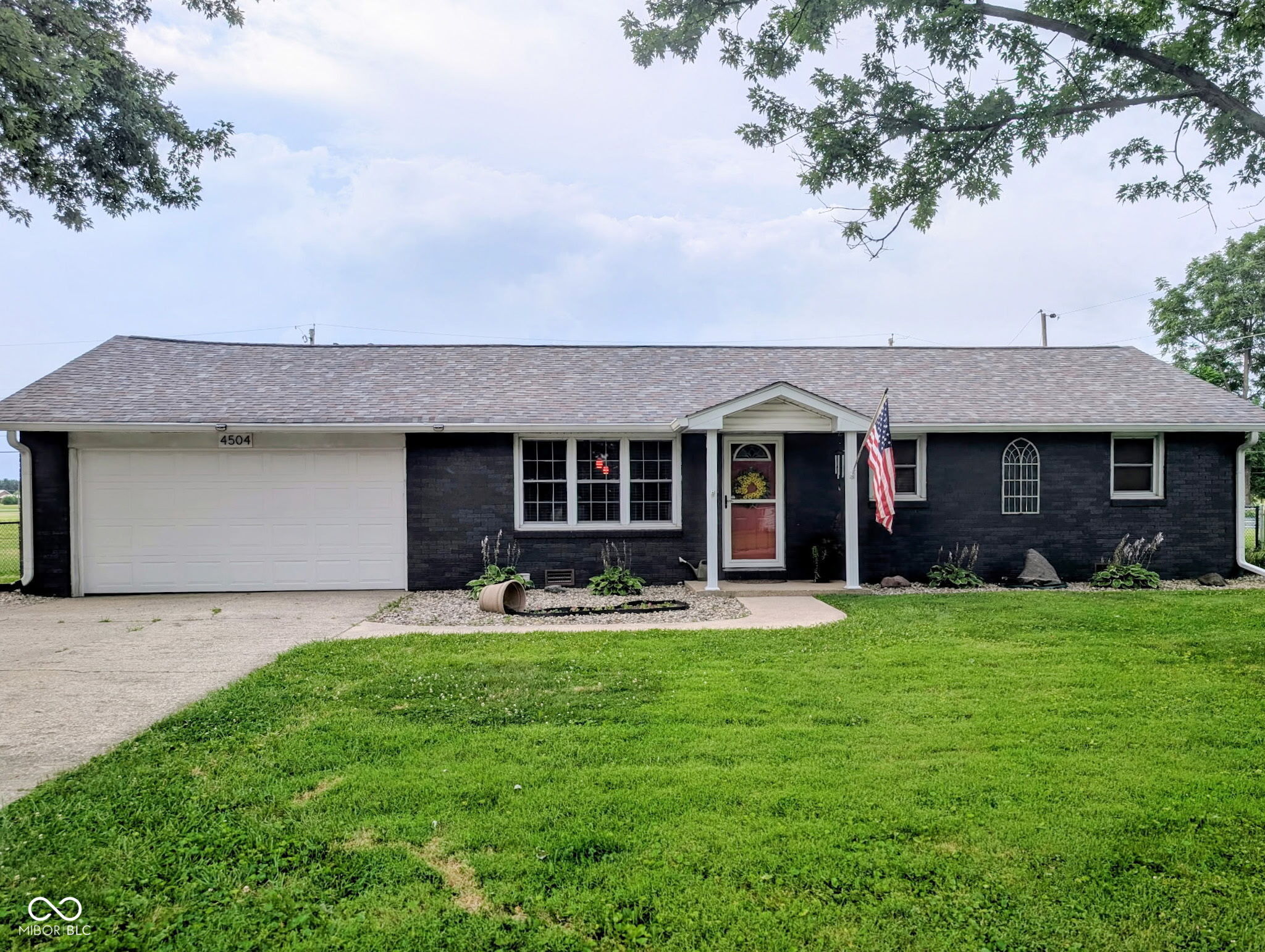 Charming 3BR Brick Ranch with Covered Patio Swing
