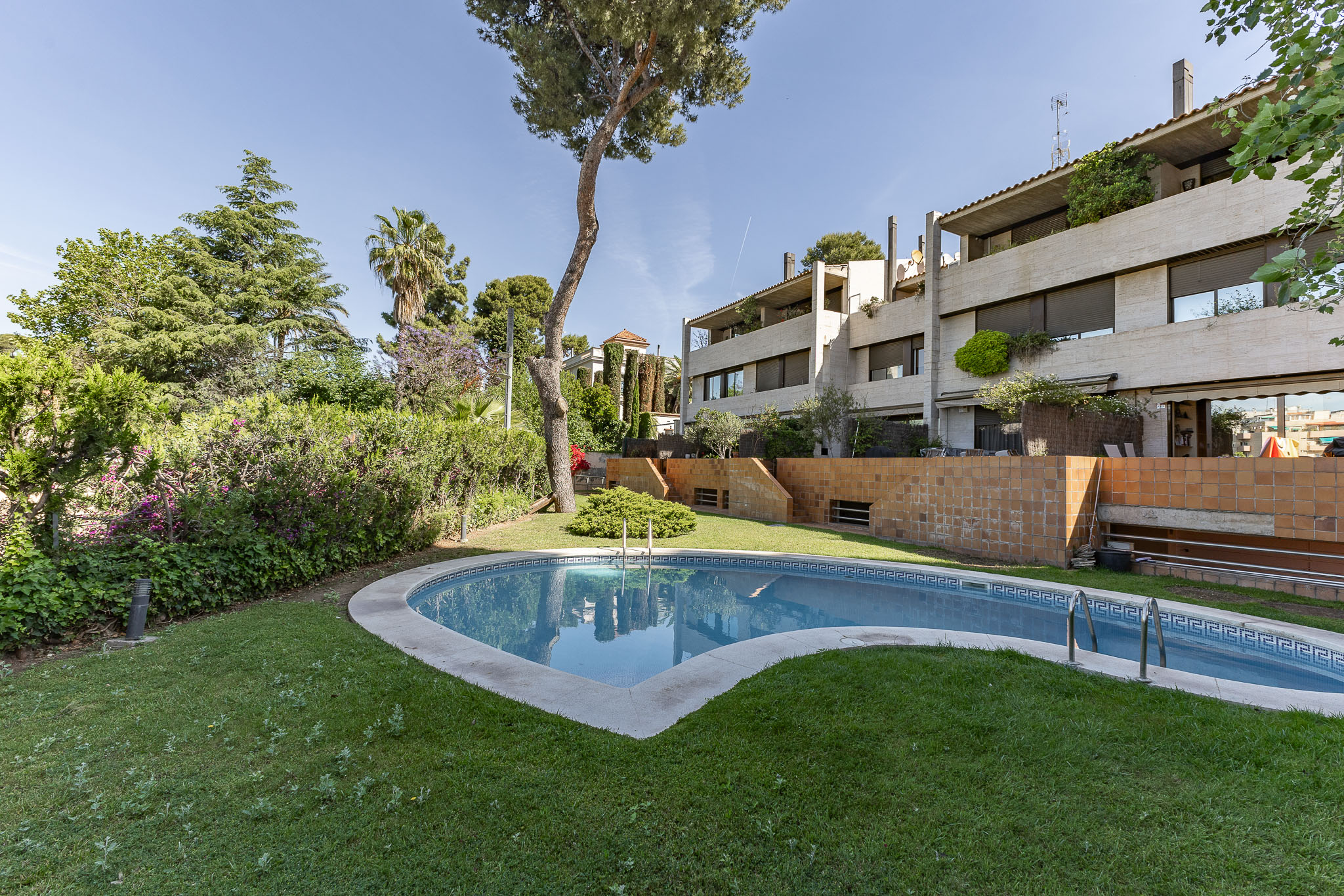 Casa exclusiva amb piscina comunitària