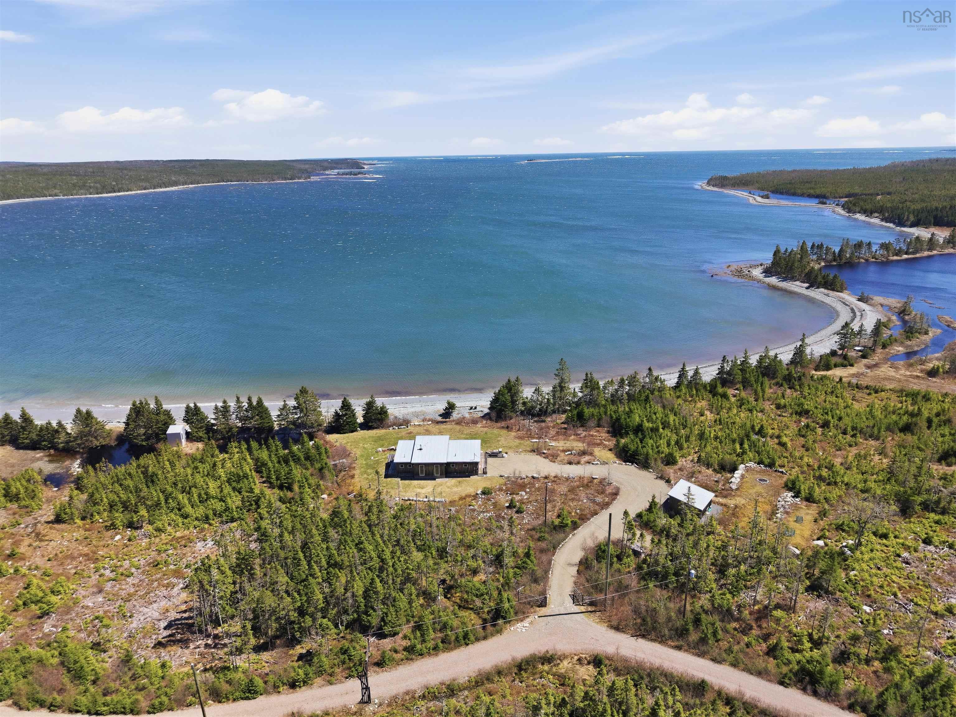 25-Acre Coastal Retreat: Modern Single-Level Home & Beach