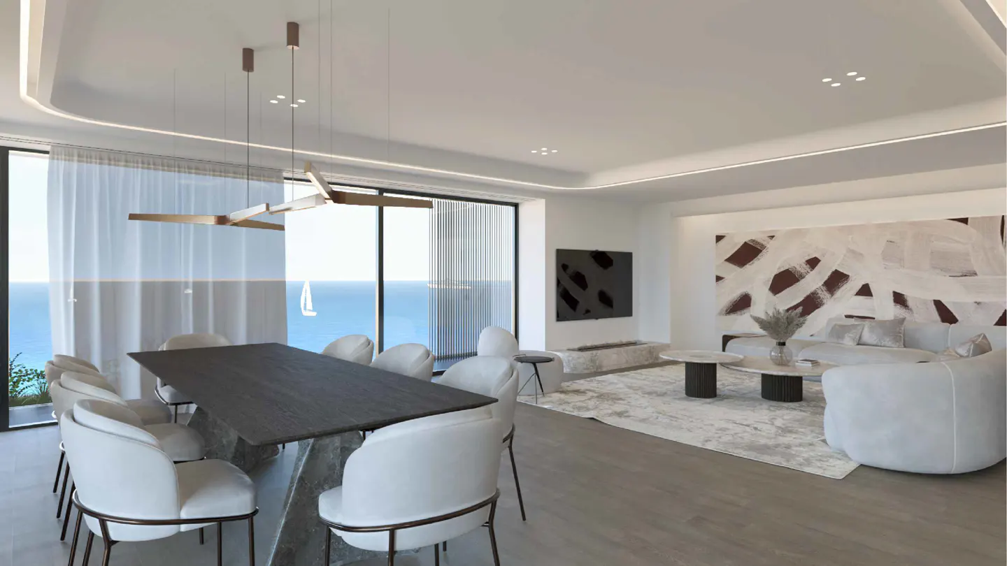 Bright, modern interior with a dining table, white chairs, and ocean view. Abstract art and a neutral color palette create a serene atmosphere.