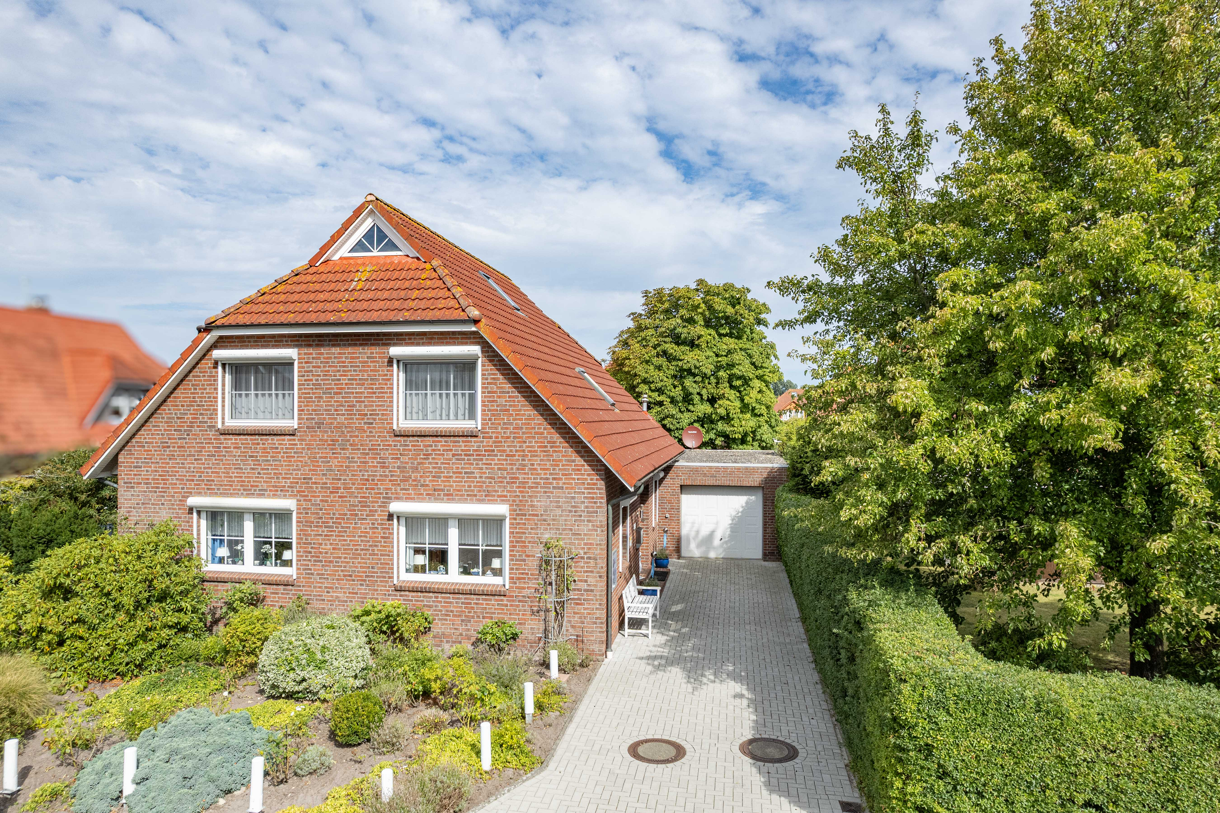 Exklusives 5 Sterne Ferienhaus mit Garage und idyllischem Garten in Carolinensiel!