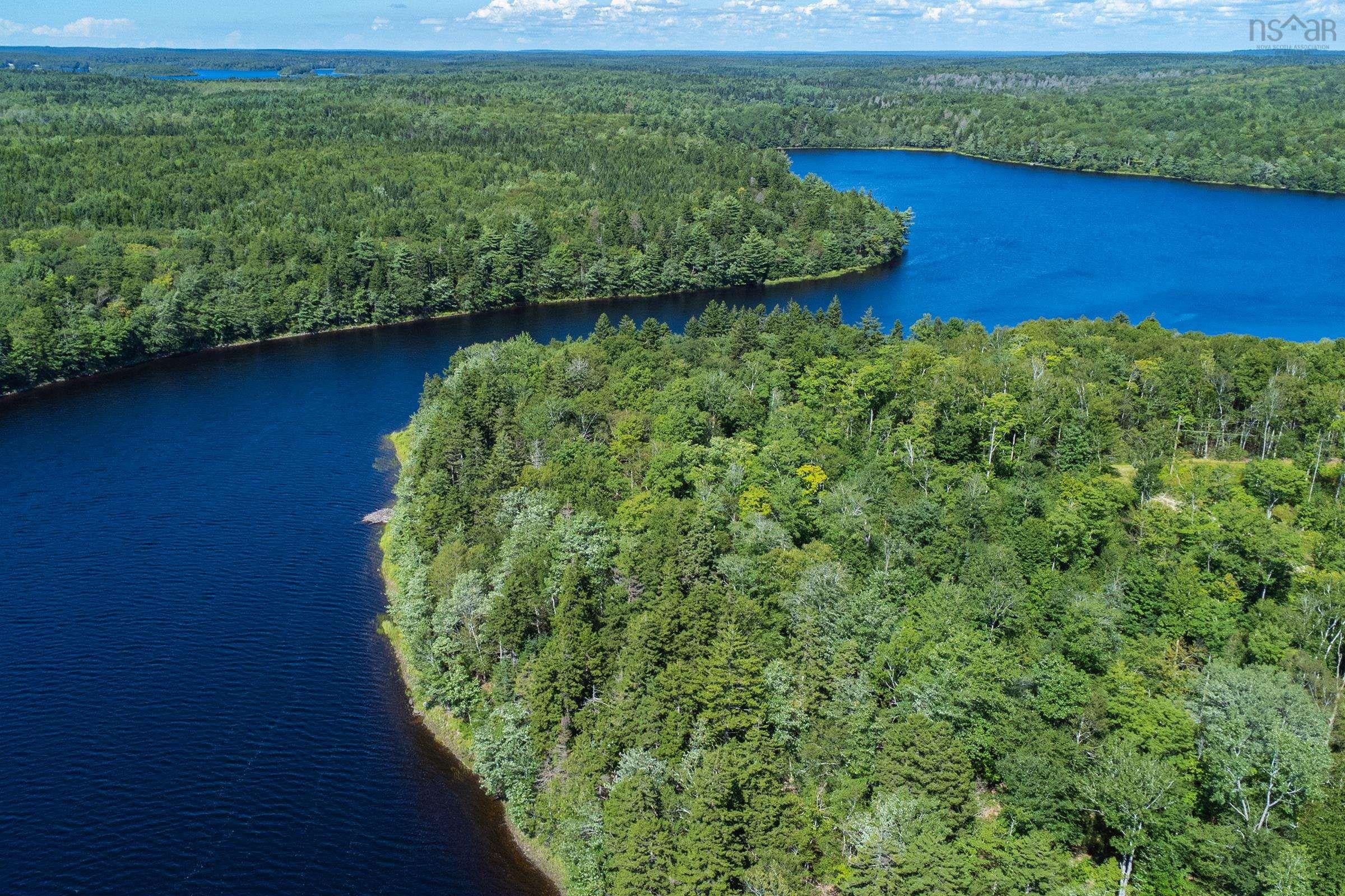 Stunning 1.61 Acre Property Offering 70 Feet of Lakefront