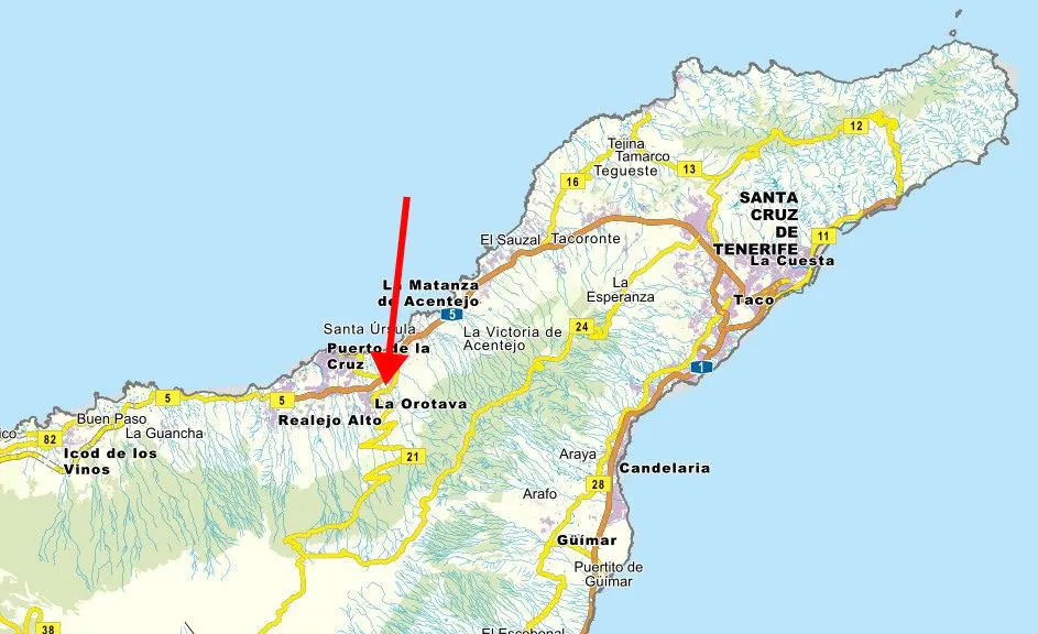 Map of Tenerife, Canary Islands, with a red arrow pointing to La Orotava. Roads are yellow, and the ocean is blue.