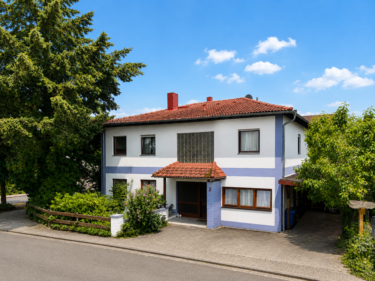 Hübsches Einfamilienhaus auf sonnigem Grundstück mit optional weiterer Wohnfläche im EG
