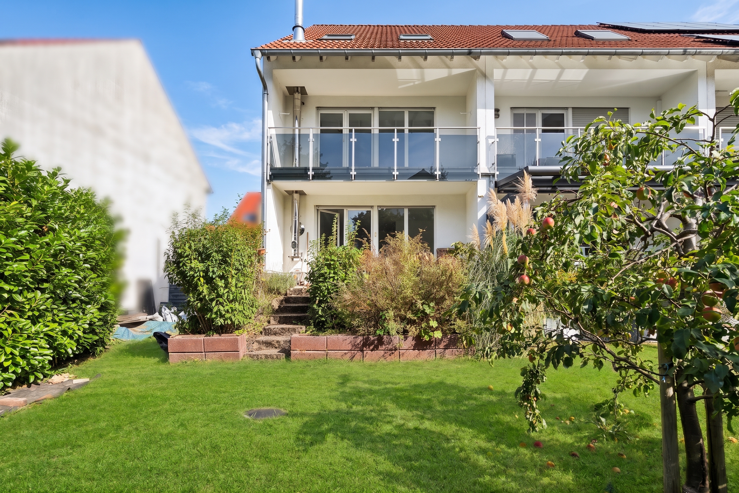 Modern townhouse with garden, balcony, and thoughtfully designed living concept [AI-modified]