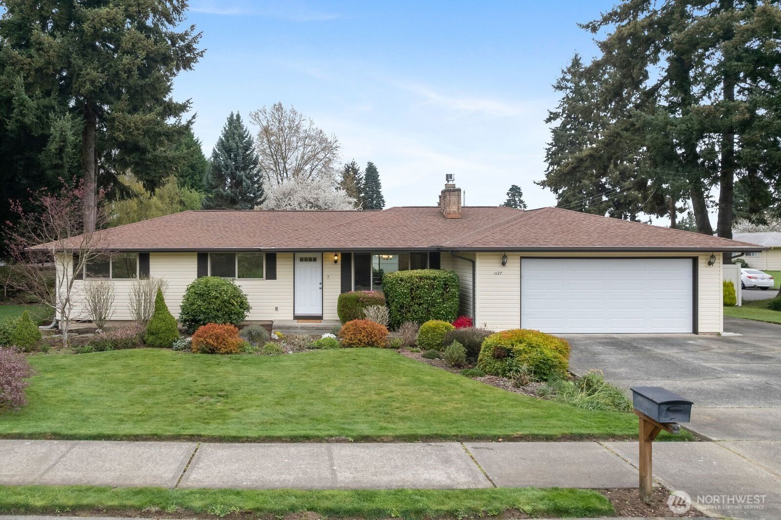 Peaceful Garden Home with Fireplace & Spacious Living