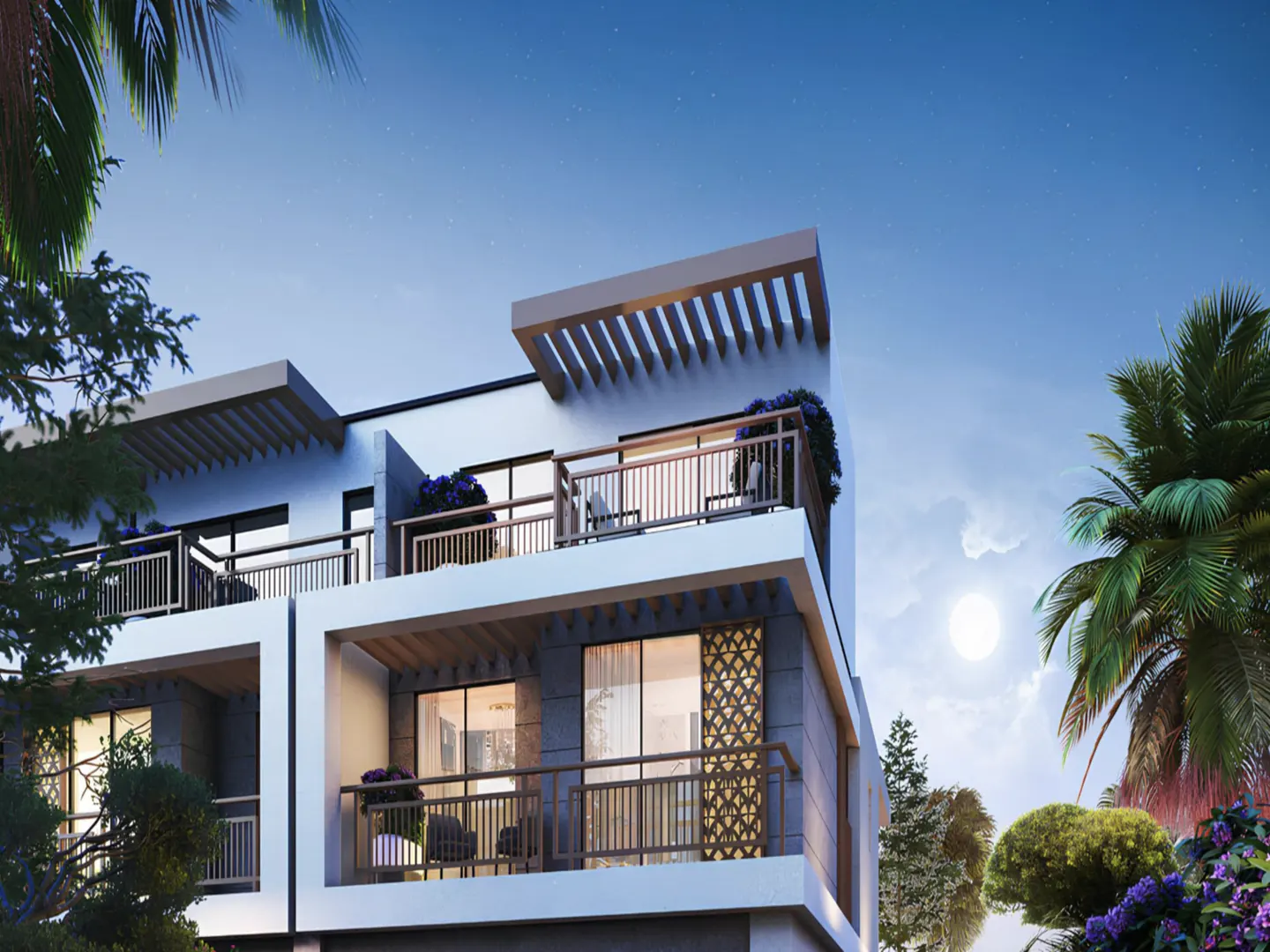 Modern two-story white townhouses with balconies, chairs, and purple flowers under a blue night sky with a full moon.
