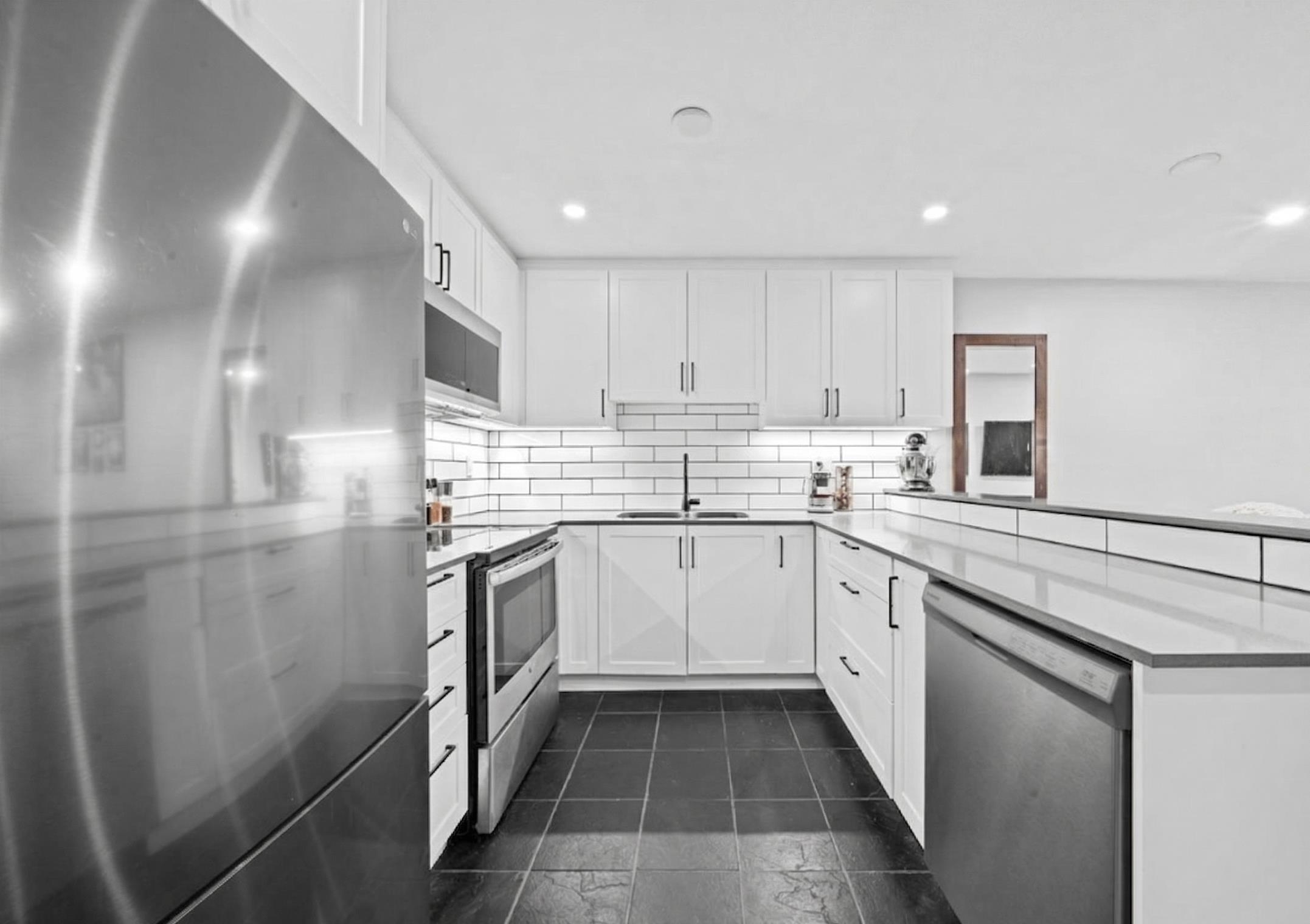 Renovated South-Facing Ground Floor Gem in Central Coquitlam