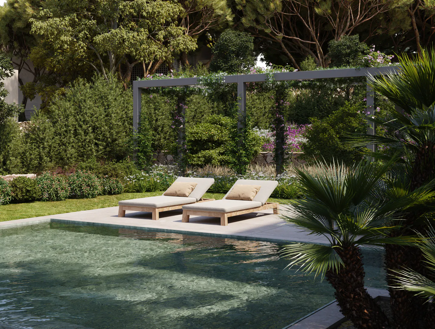 Two lounge chairs sit poolside on a sunny day. Lush greenery and a pergola create a relaxing outdoor space.