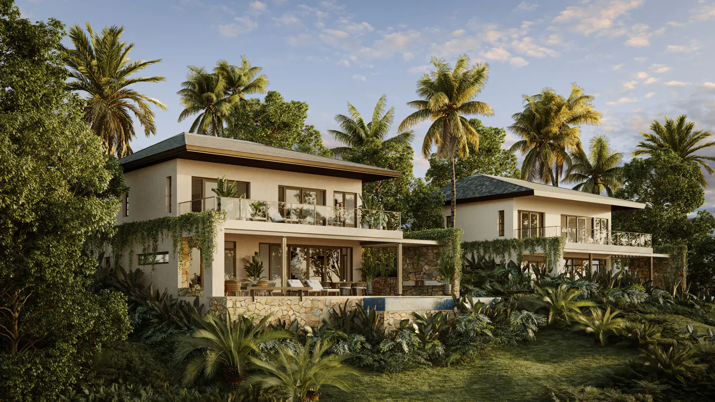 Two-story beige villas nestled in lush tropical greenery under a blue sky with palm trees. Balconies with glass railings and outdoor furniture.