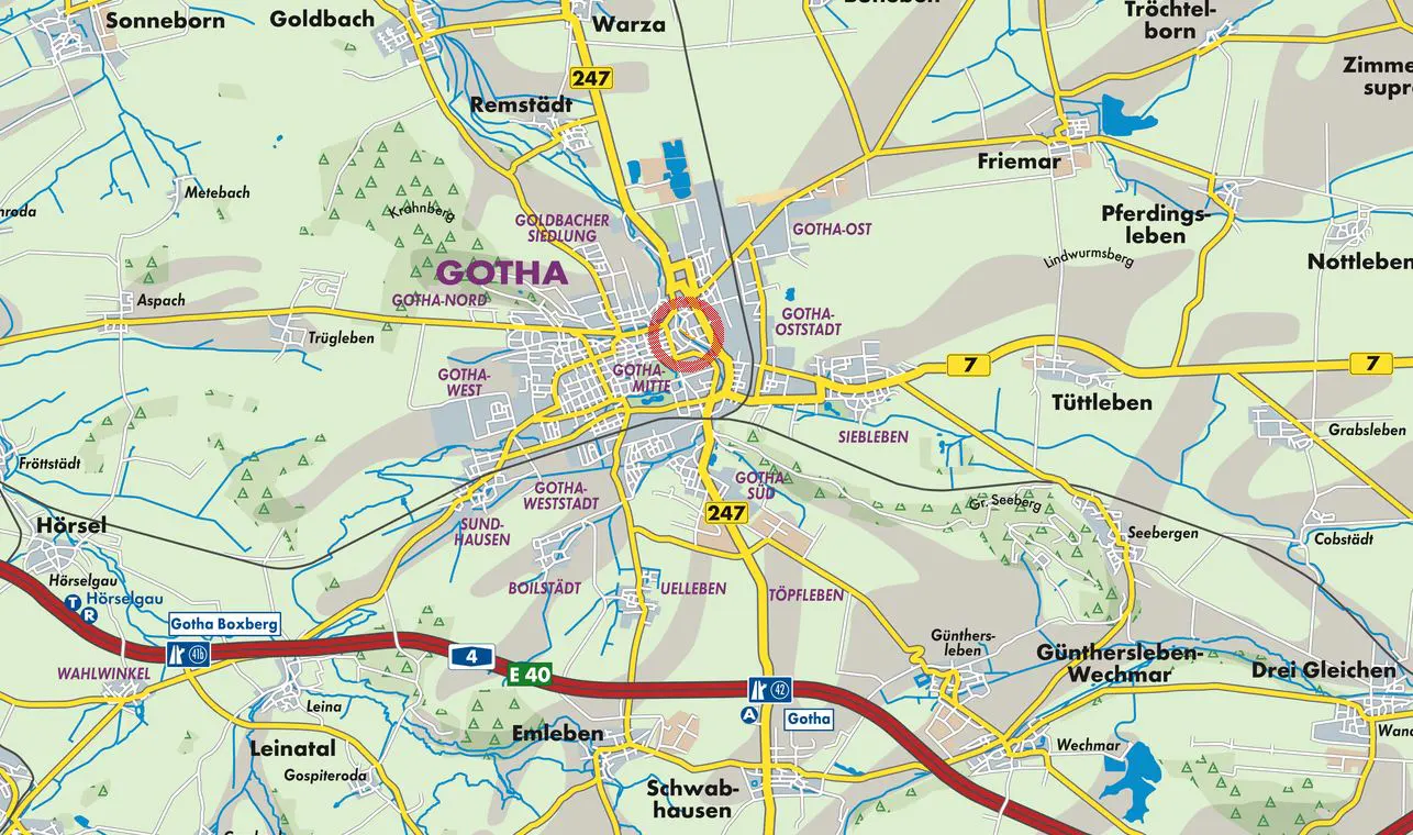 Map of Gotha, Germany, with roads in yellow and red, and green areas. A red circle highlights the city center, labeled "Gotha Mitte."