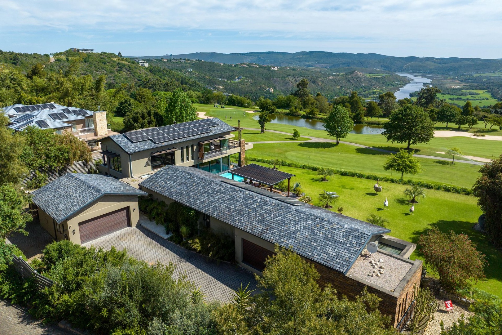 Contemporary Elegance with Breathtaking Knysna River & Golf Course Views