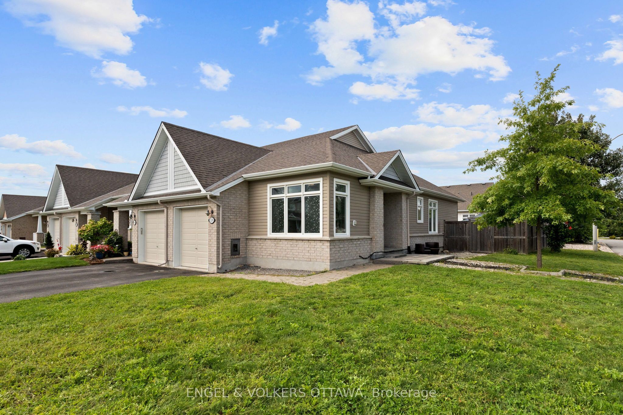 Bright Corner-Unit Bungalow on an Oversized Corner Lot