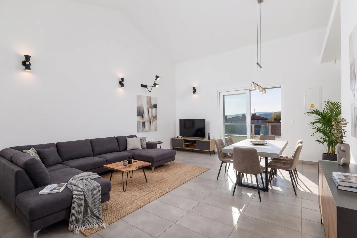 AI-generated visualisation of the light-filled living/dining area in a modern style (furniture not included)